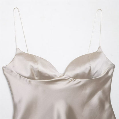 Top satin dos nu femme.